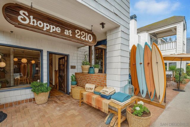 a front view of a building with seating space