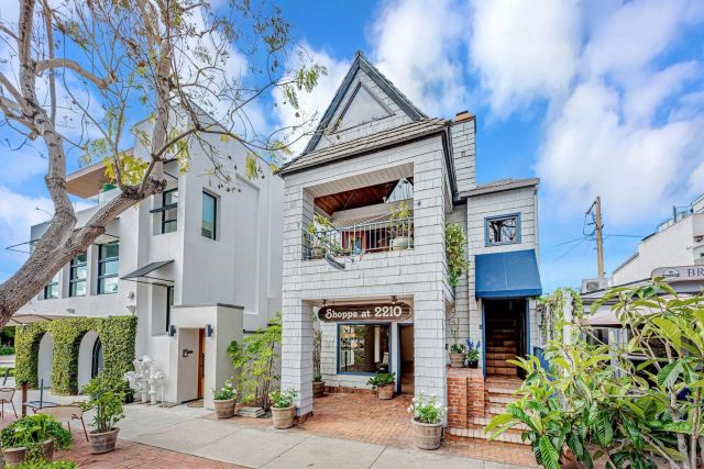 a front view of a building with street