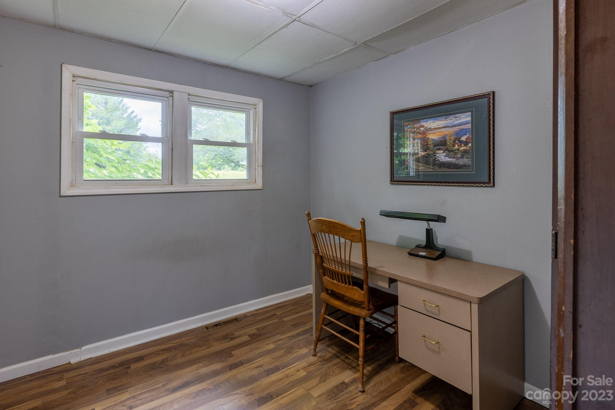 777 Glenn Bridge Road Arden, NC 28704 - Photo 15 of 22 a workspace with furniture and a window
