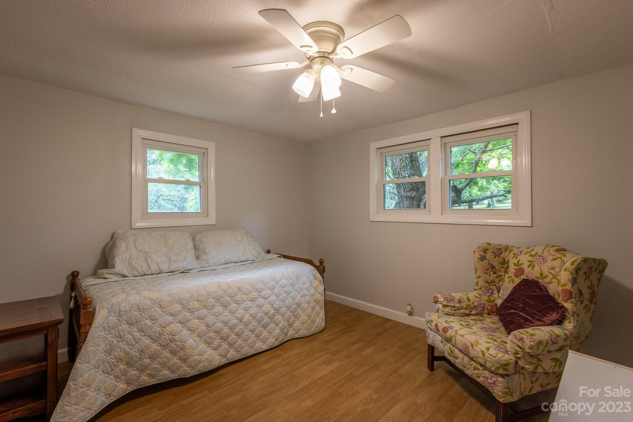 777 Glenn Bridge Road Arden, NC 28704 - Photo 16 of 22 a bedroom with a bed and window