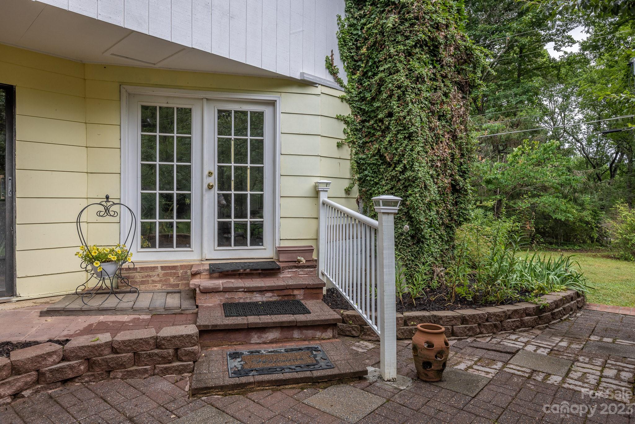 777 Glenn Bridge Road Arden, NC 28704 - Photo 21 of 22 a front view of a house with a yard
