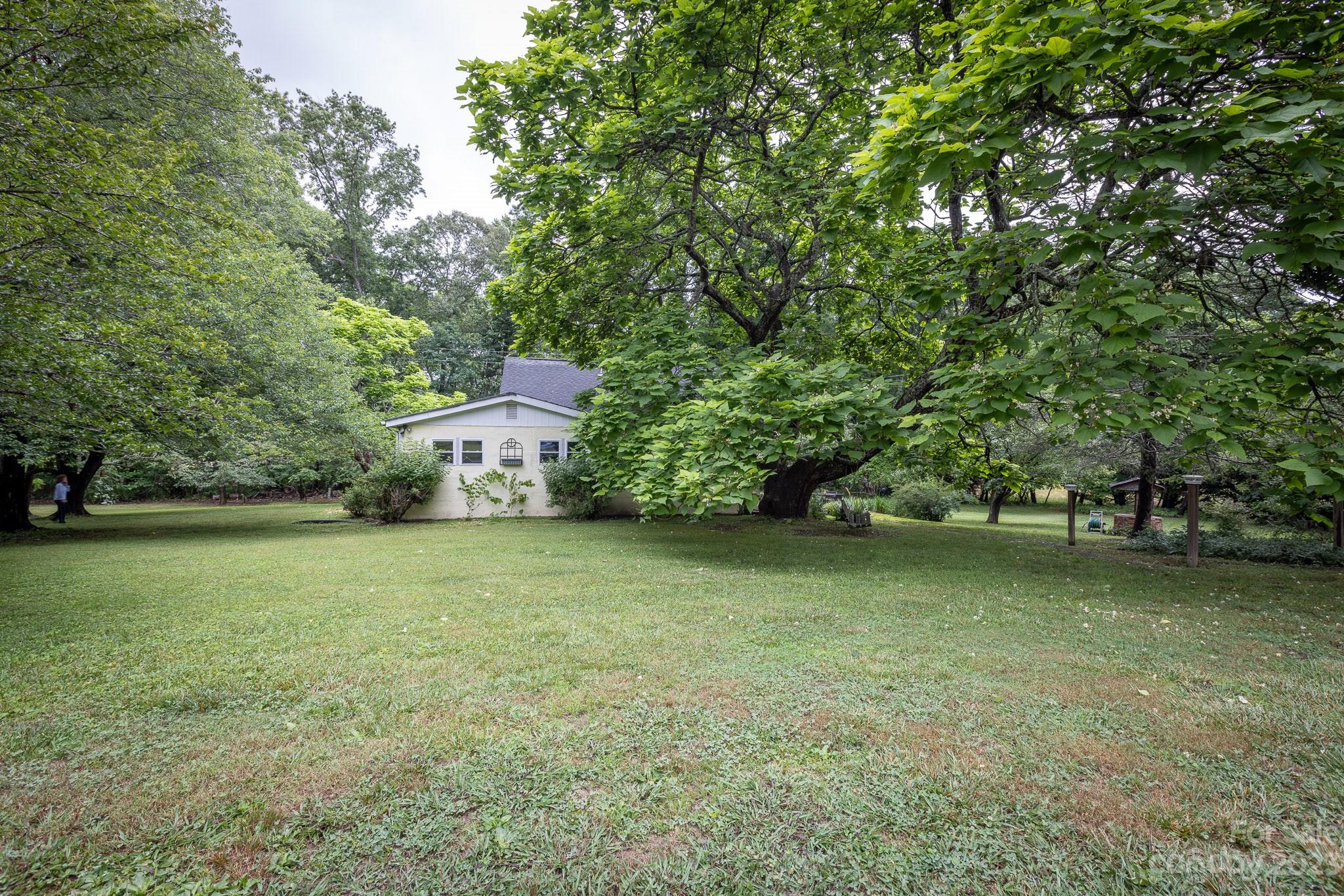 777 Glenn Bridge Road Arden, NC 28704 - Photo 6 of 22 a front view of a house with a yard