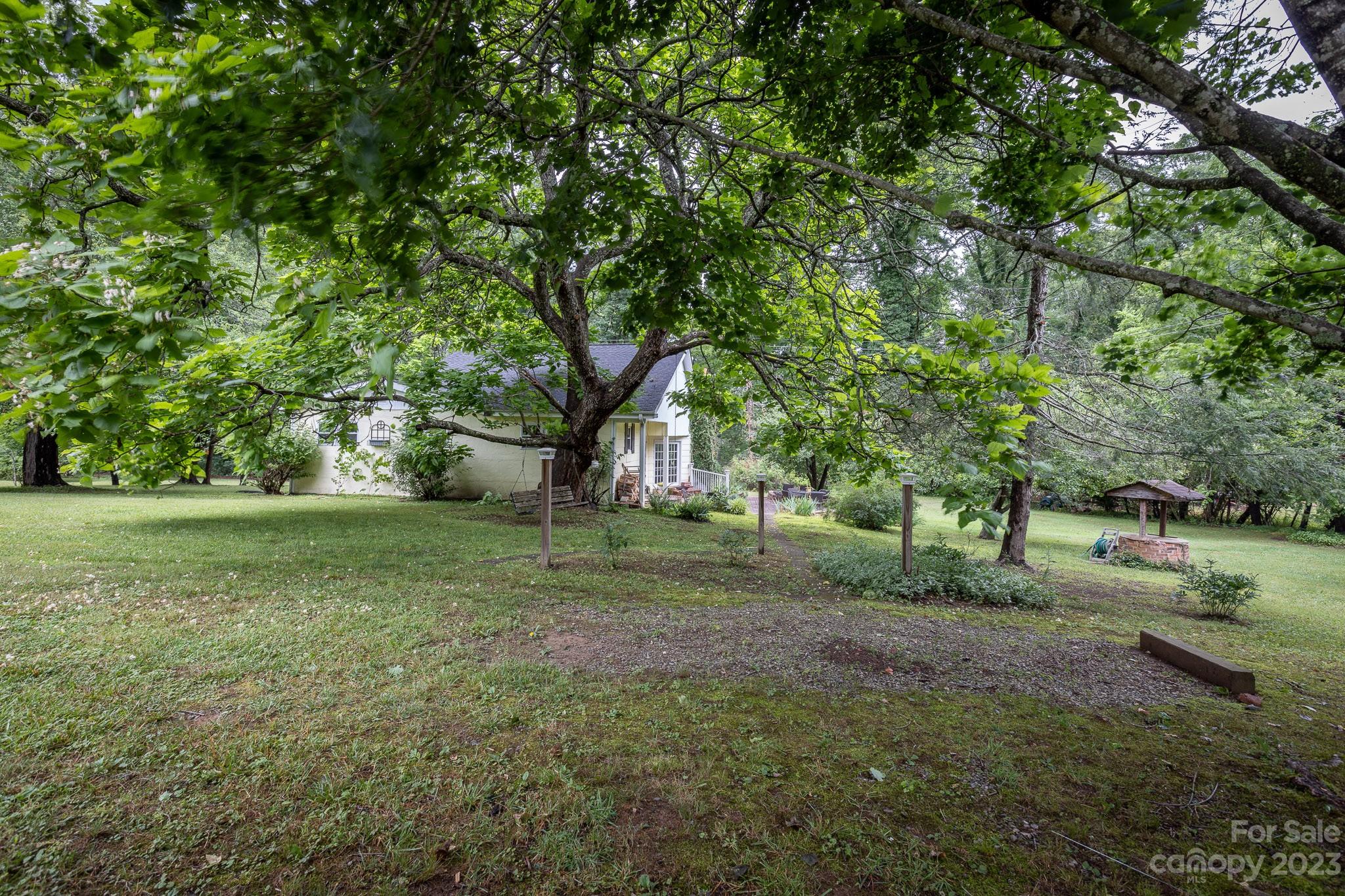 777 Glenn Bridge Road Arden, NC 28704 - Photo 7 of 22 a view of outdoor space with deck and yard