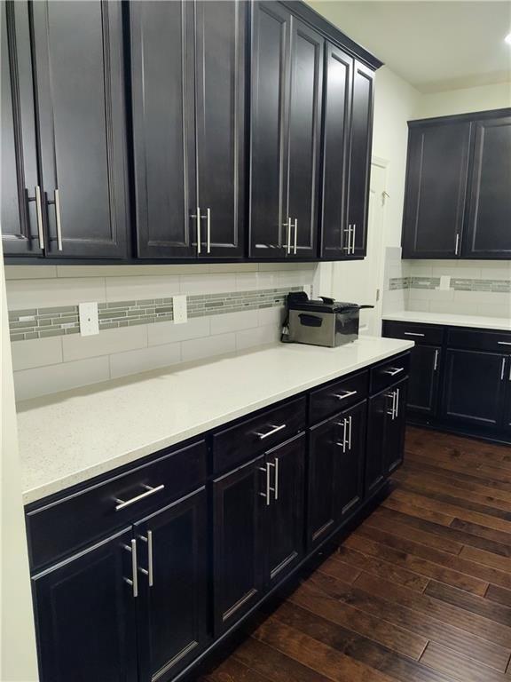 7736 Rutgers Circle Fairburn, GA 30213 - Photo 30 of 39 a kitchen with a sink and cabinets