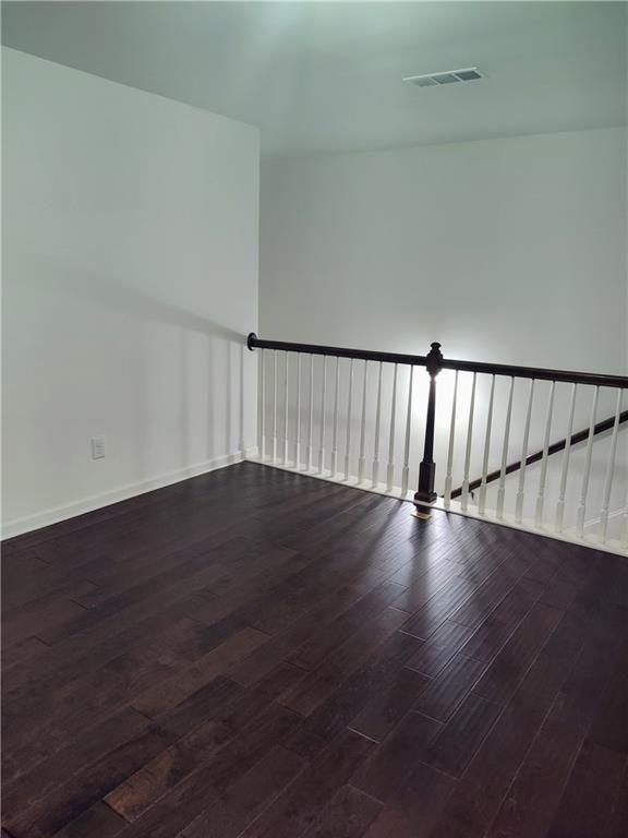 7736 Rutgers Circle Fairburn, GA 30213 - Photo 34 of 39 a view of wooden floor and staircase in a room