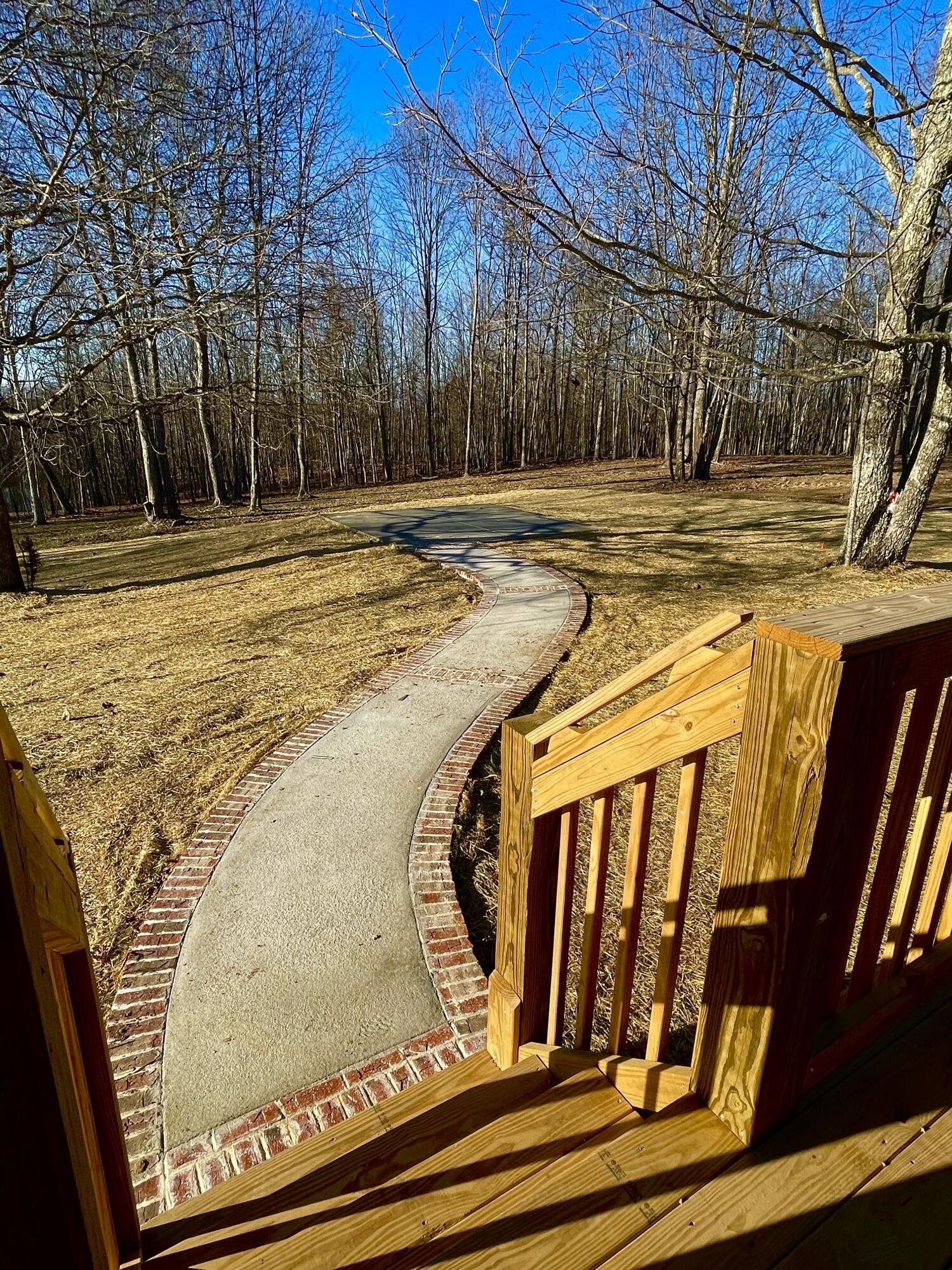 28 Autumn Way Dunlap, TN 37327 - Photo 16 of 102 IMG_7551 - Rear Walkway to Concrete Pad