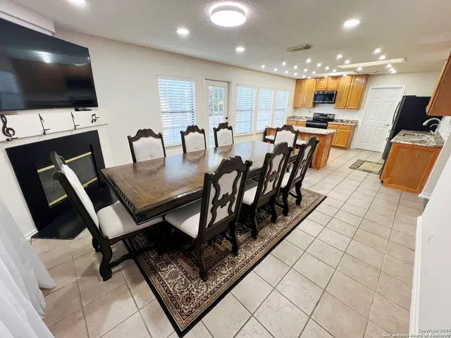 a view of a dining room with furniture