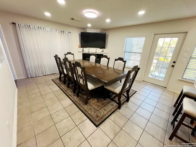 a view of a dining room with furniture