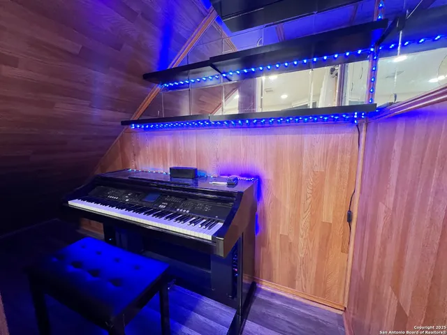 a view of a room with bed