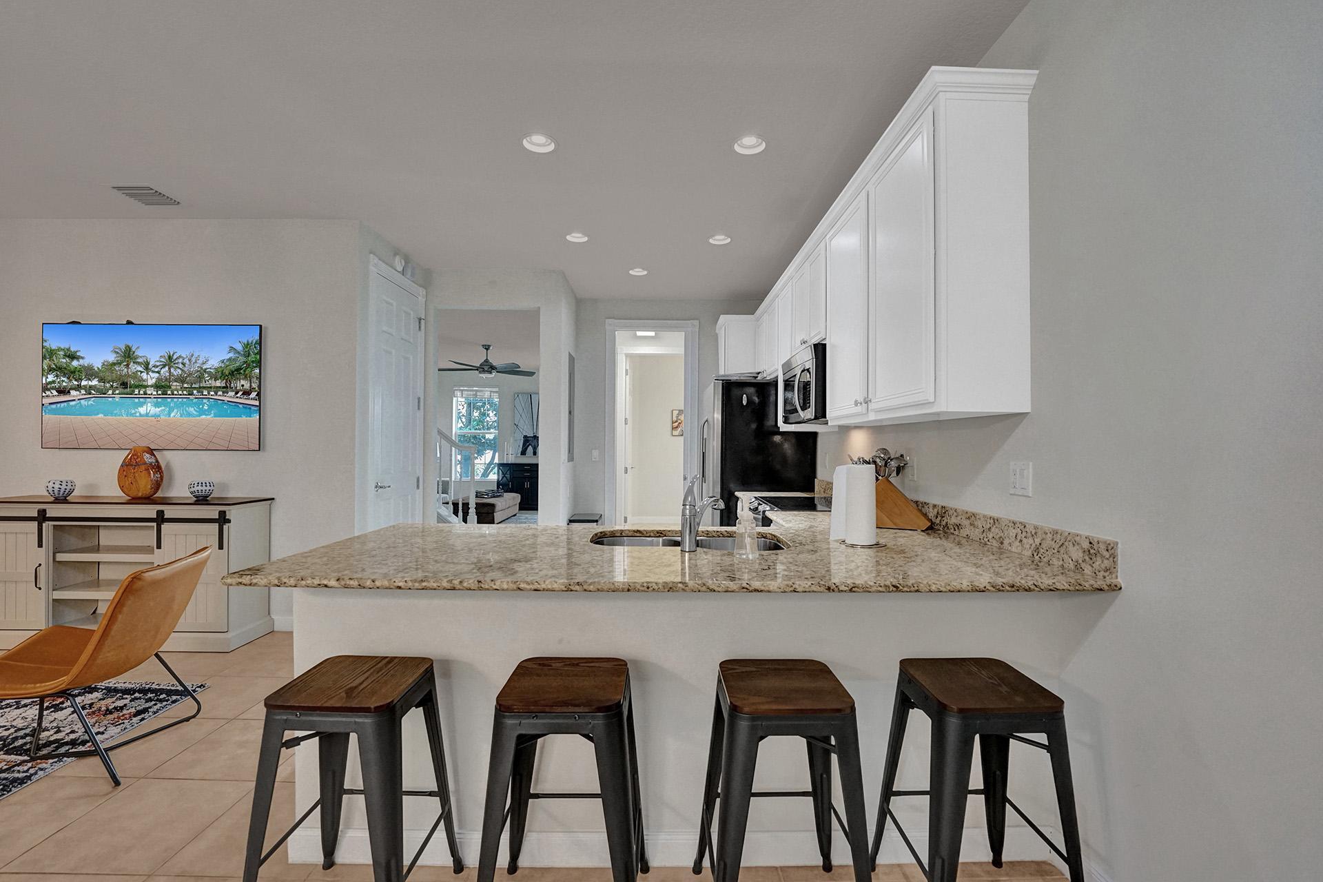 1172 Islamorada Drive Jupiter, FL 33458 - Photo 12 of 42 a view of a dining room with furniture