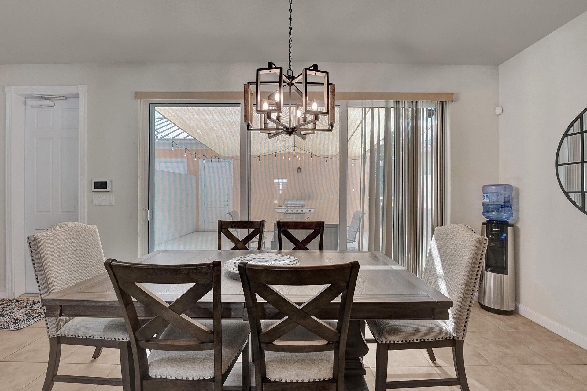 1172 Islamorada Drive Jupiter, FL 33458 - Photo 14 of 42 a view of a dining room with furniture and window
