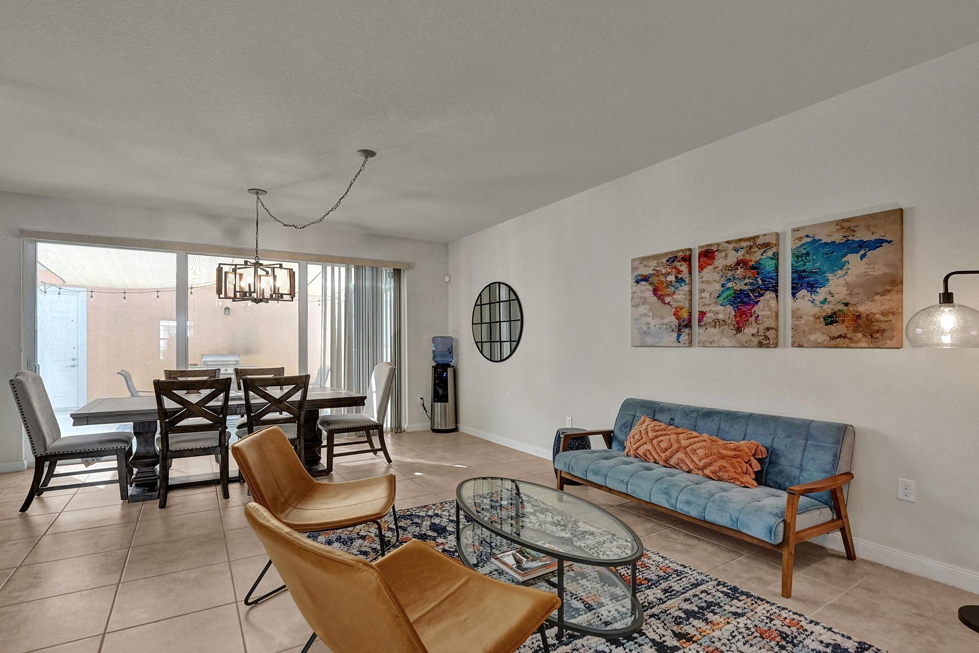 1172 Islamorada Drive Jupiter, FL 33458 - Photo 17 of 42 a living room with furniture and a large window