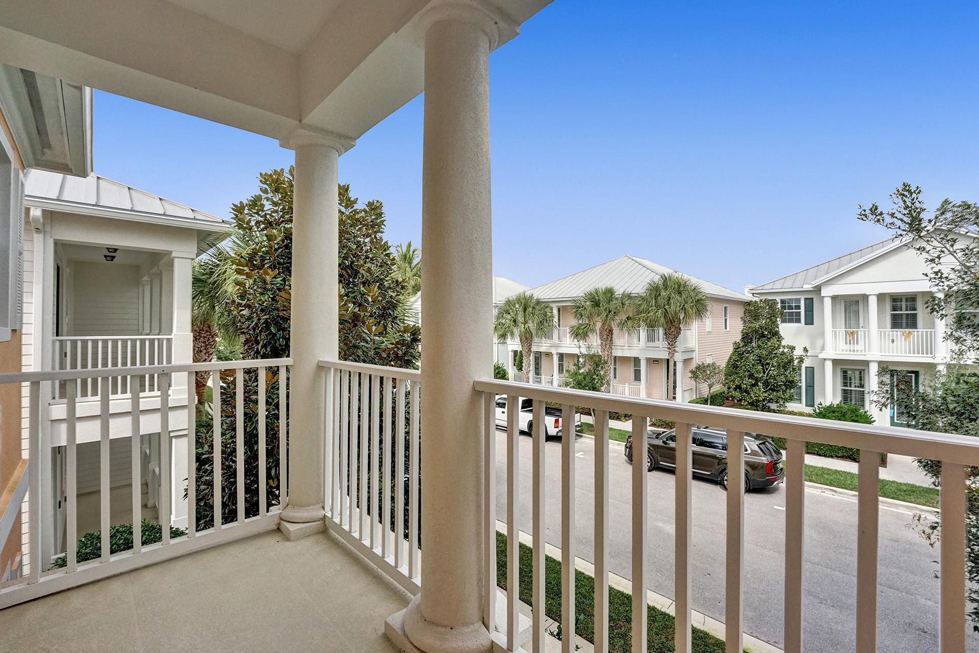 1172 Islamorada Drive Jupiter, FL 33458 - Photo 29 of 42 a view of a houses with a small yard