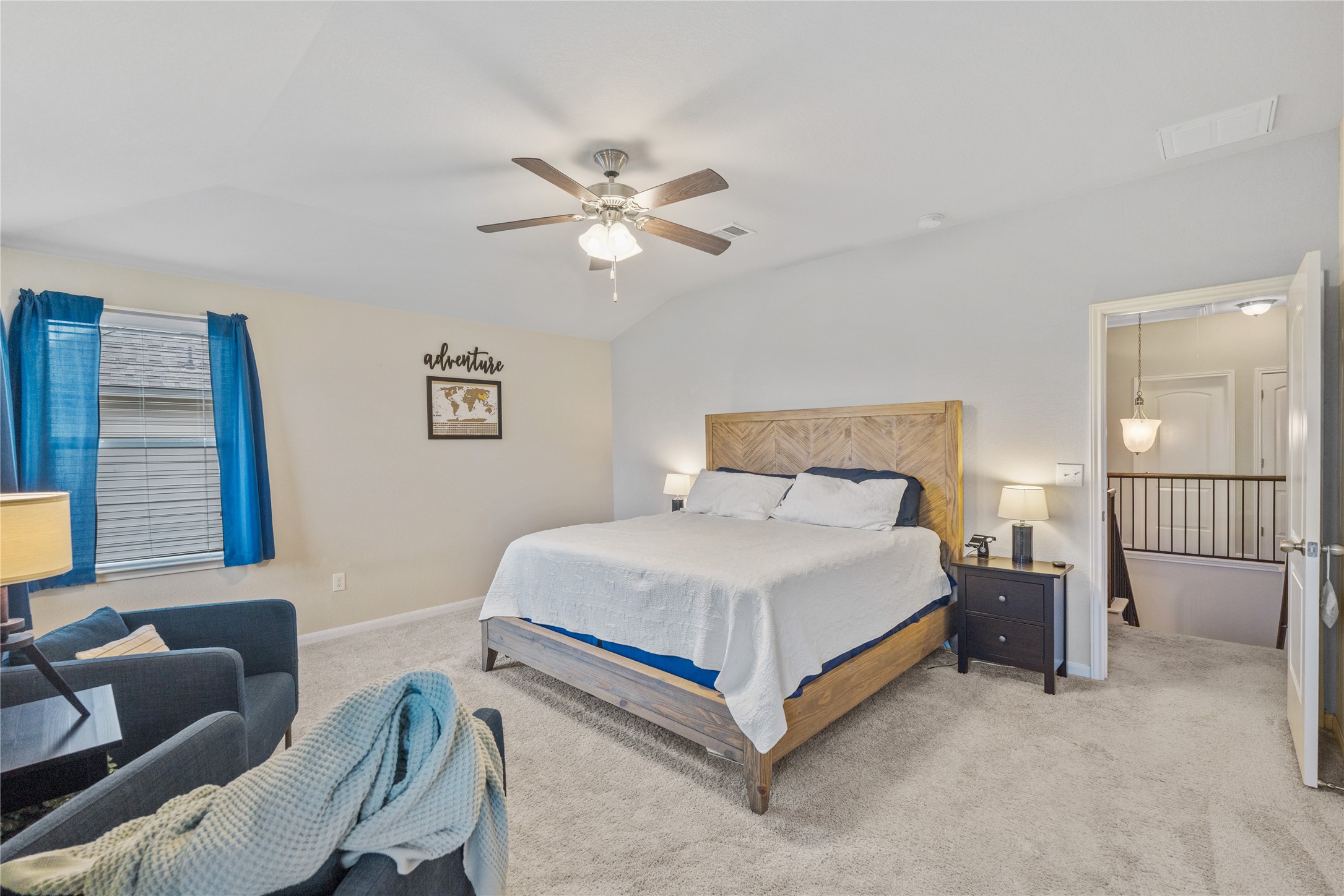 116 Cypress Bend Court Georgetown, TX 78626 - Photo 17 of 35 a bedroom with a bed couch and a window