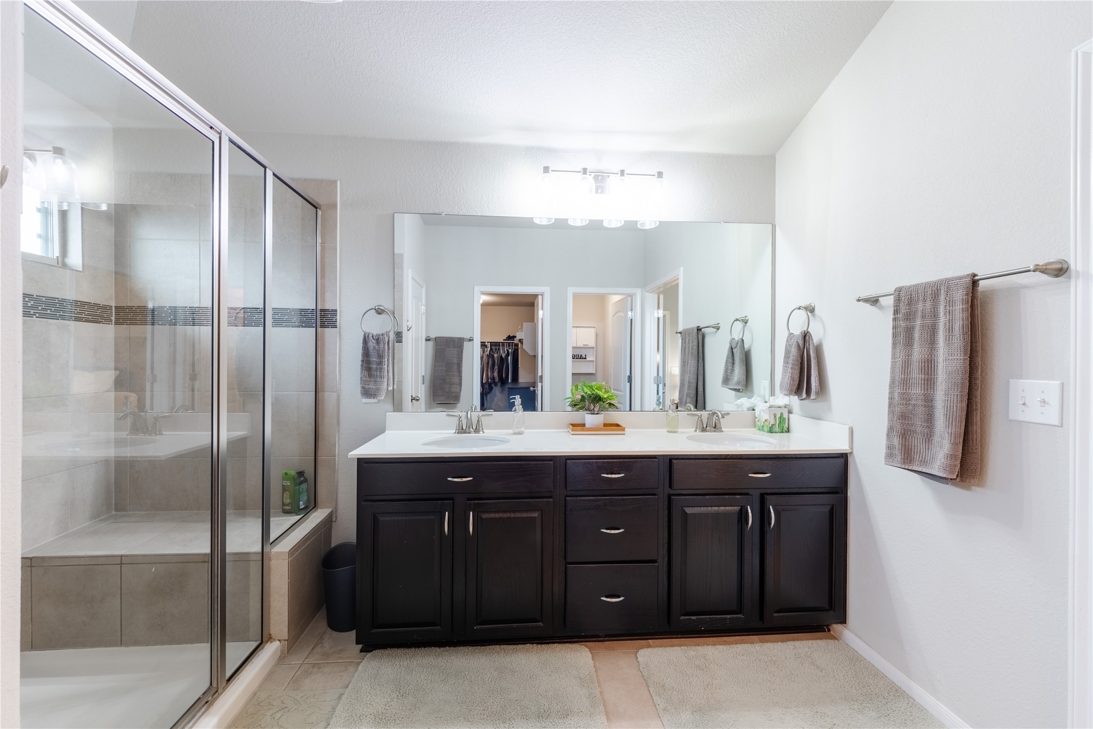 116 Cypress Bend Court Georgetown, TX 78626 - Photo 19 of 35 a bathroom with a granite countertop sink mirror and double