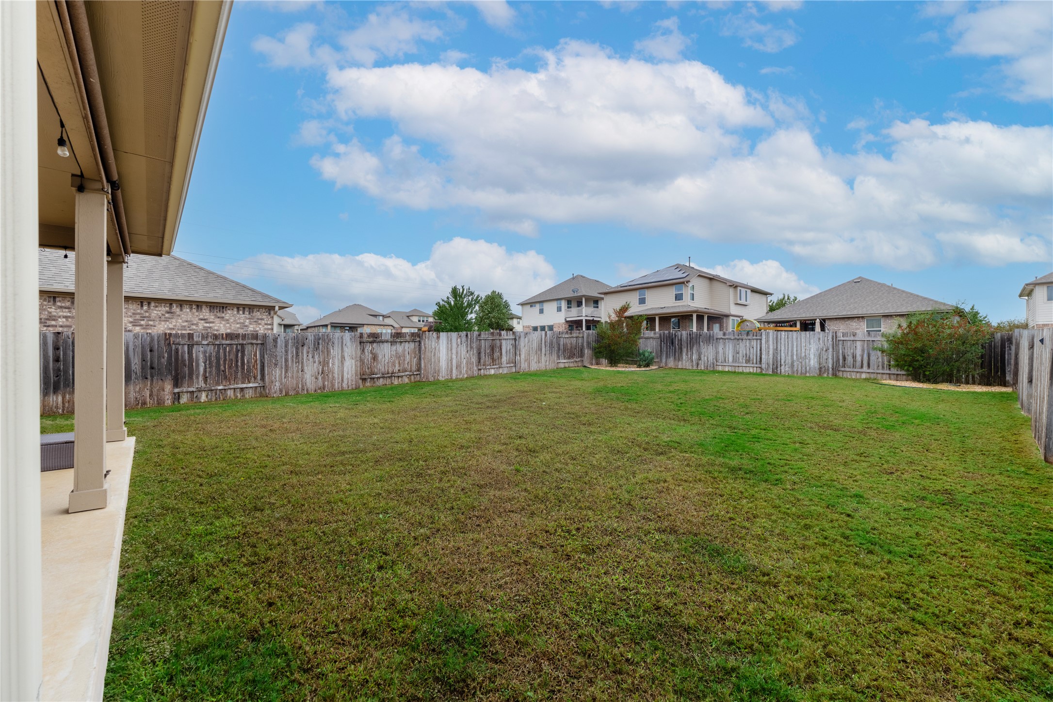 116 Cypress Bend Court Georgetown, TX 78626 - Photo 25 of 35 a view of a house with a big yard next to a yard