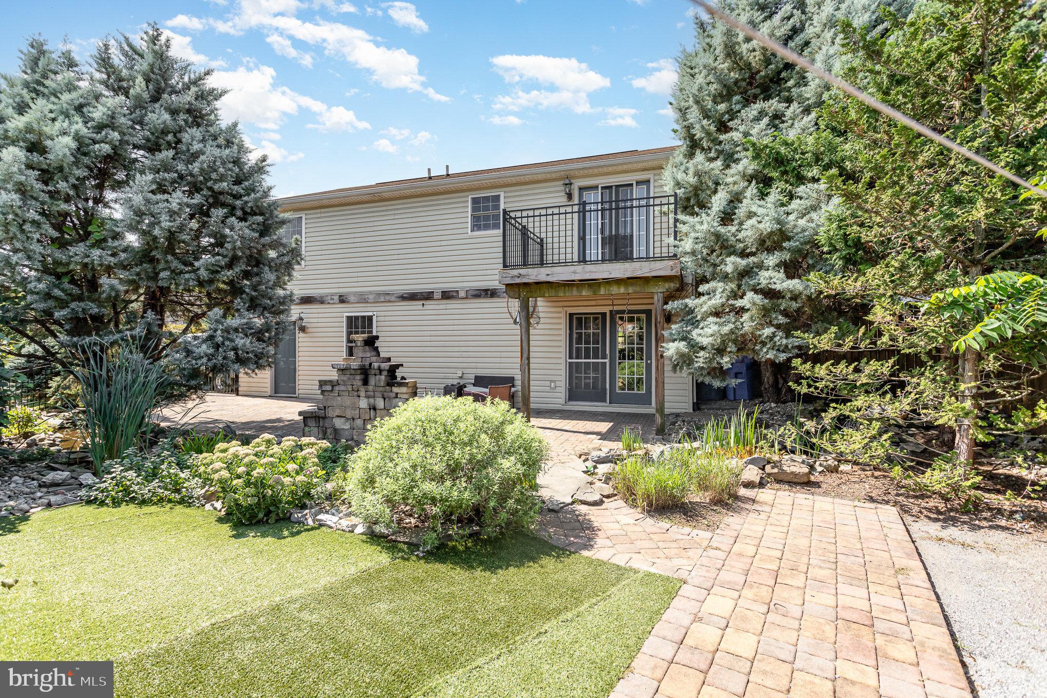 85 Apache Trail York Haven, PA 17370 - Photo 26 of 34 backyard walkway and view of house