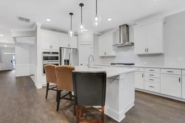 a view of a stove and a microwave