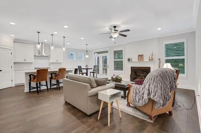 a en suite bathroom with a double vanity sink mirror and shower