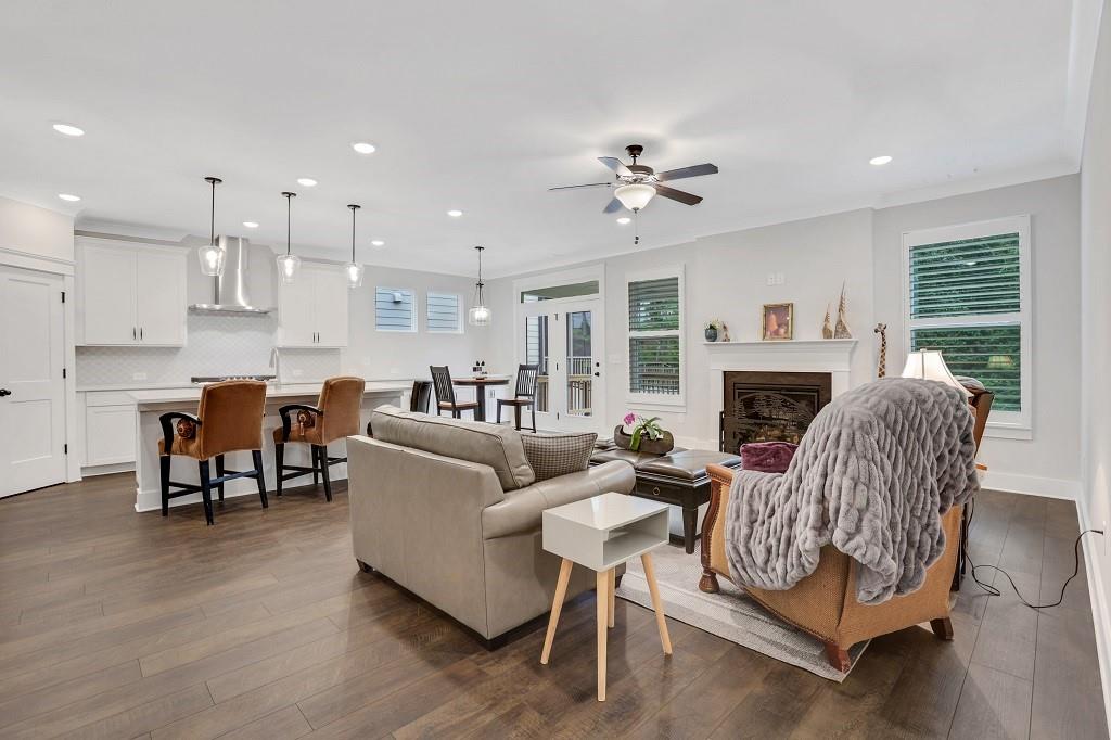 413 Solace Place Canton, GA 30114 - Photo 21 of 75 a living room with furniture and a fireplace