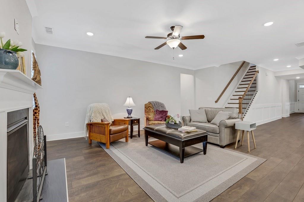 413 Solace Place Canton, GA 30114 - Photo 23 of 75 a living room with furniture and a fireplace