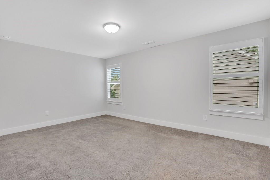 413 Solace Place Canton, GA 30114 - Photo 35 of 75 an empty room with a window