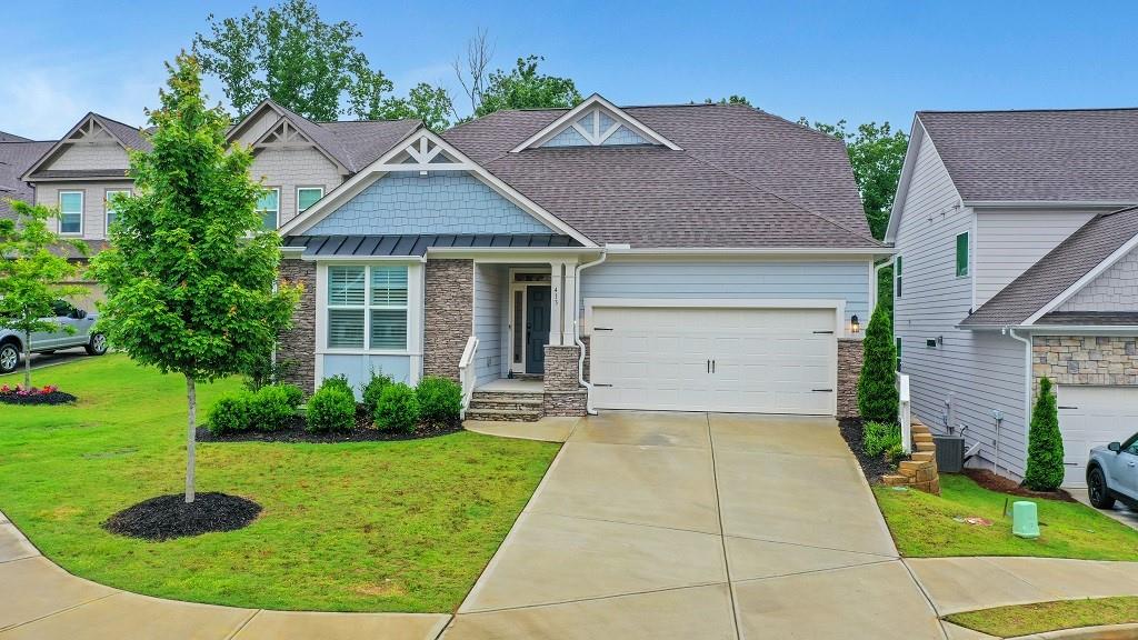 413 Solace Place Canton, GA 30114 - Photo 60 of 75 a view of a house with backyard