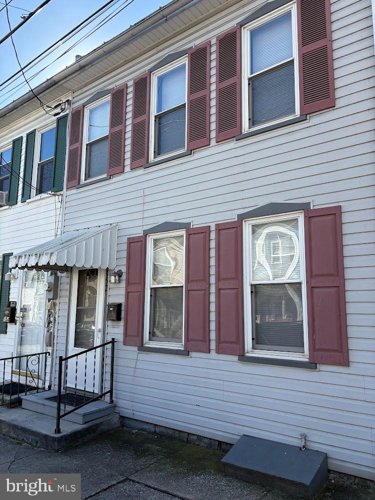 156 East Penn Street Carlisle, PA 17013 - Photo 1 of 17 a view of brick building with a bench