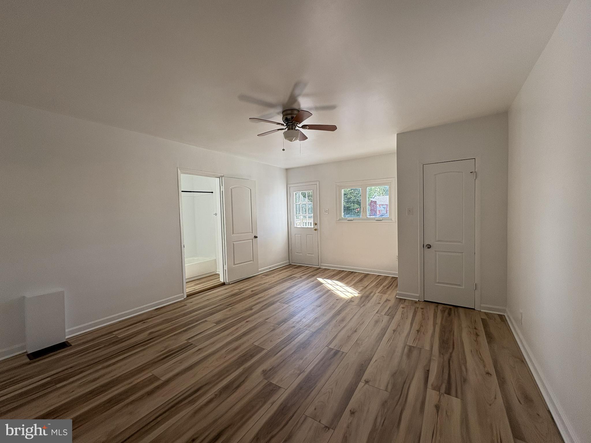 156 East Penn Street Carlisle, PA 17013 - Photo 11 of 17 wooden floor in an empty room with a window