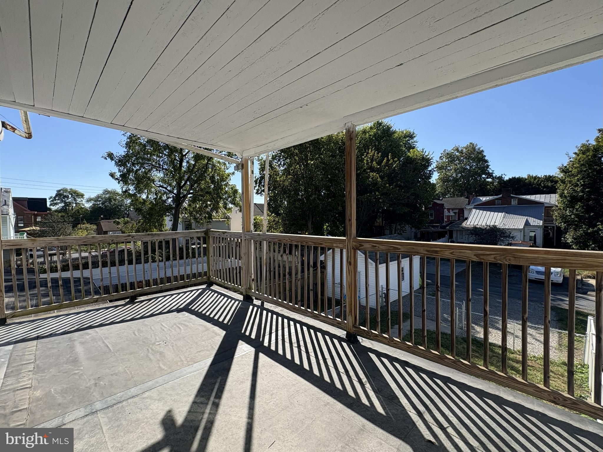 156 East Penn Street Carlisle, PA 17013 - Photo 9 of 17 a balcony with view of trees in the background