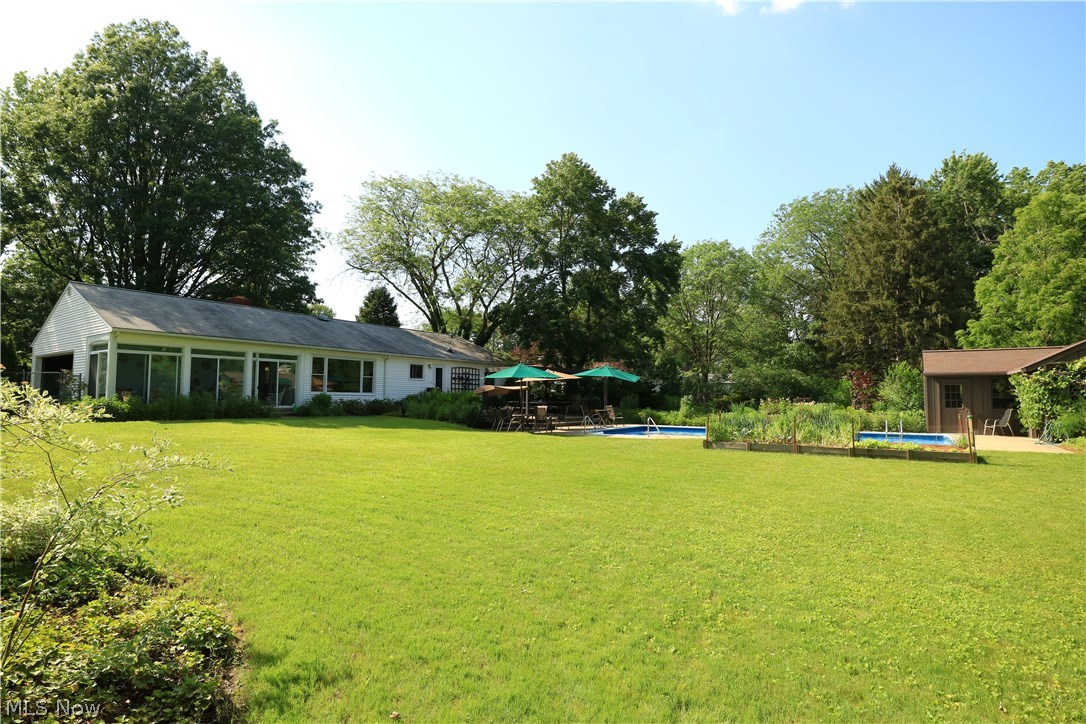 133 Pyle Road Oberlin, OH 44074 - Photo 3 of 25 Exterior back, yard, pool and pool house.
