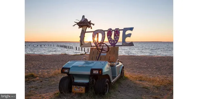 a view of a chairs and table in patio