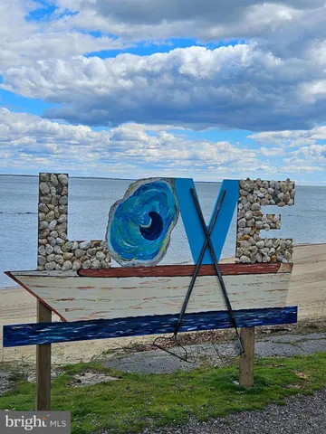 a view of a chairs and table in a balcony