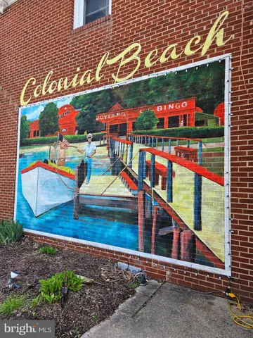 a view of a bench in the grass