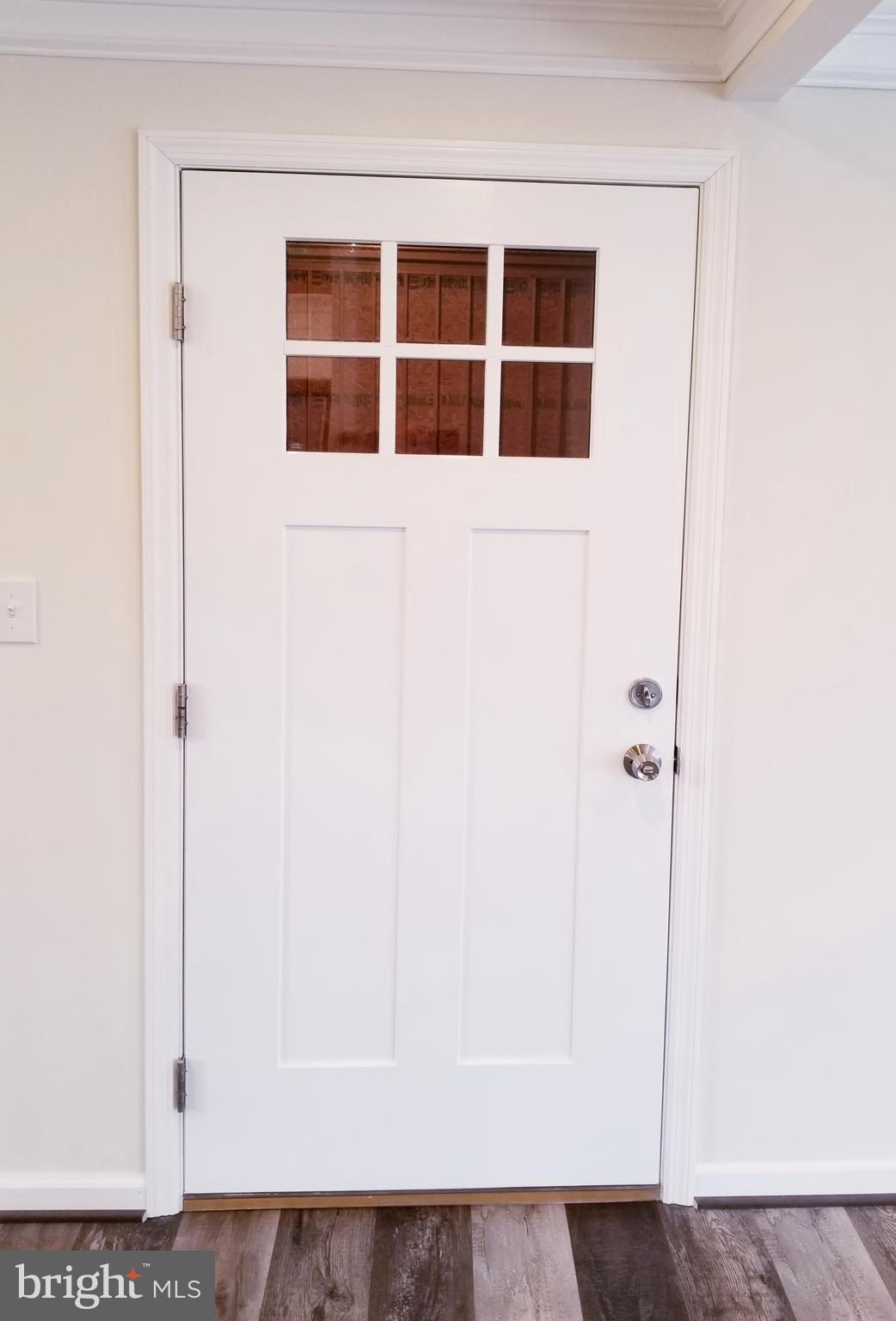 7941 East Shore Road Pasadena, MD 21122 - Photo 16 of 28 Door to the Garage From the Kitchen