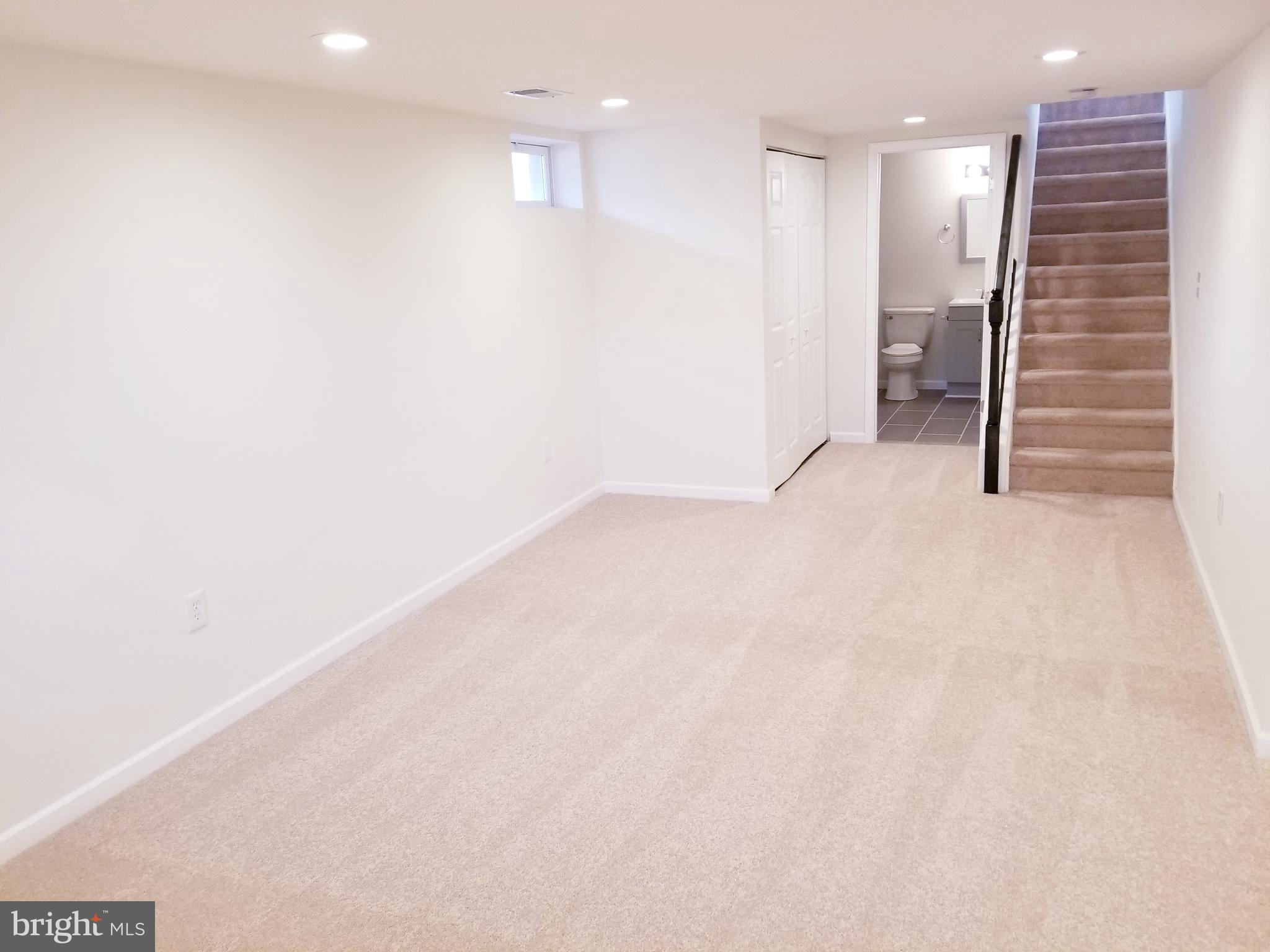 7941 East Shore Road Pasadena, MD 21122 - Photo 22 of 28 Stairwell to Large Family Room