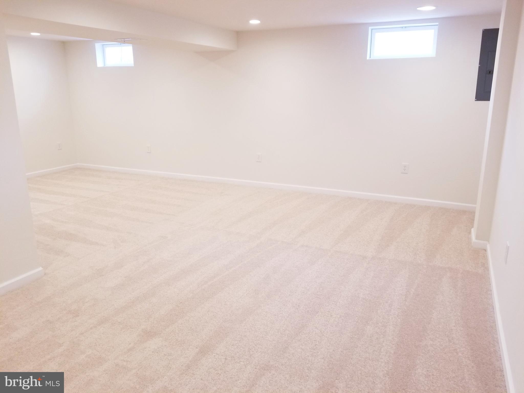 7941 East Shore Road Pasadena, MD 21122 - Photo 25 of 28 Lower Level Family Room