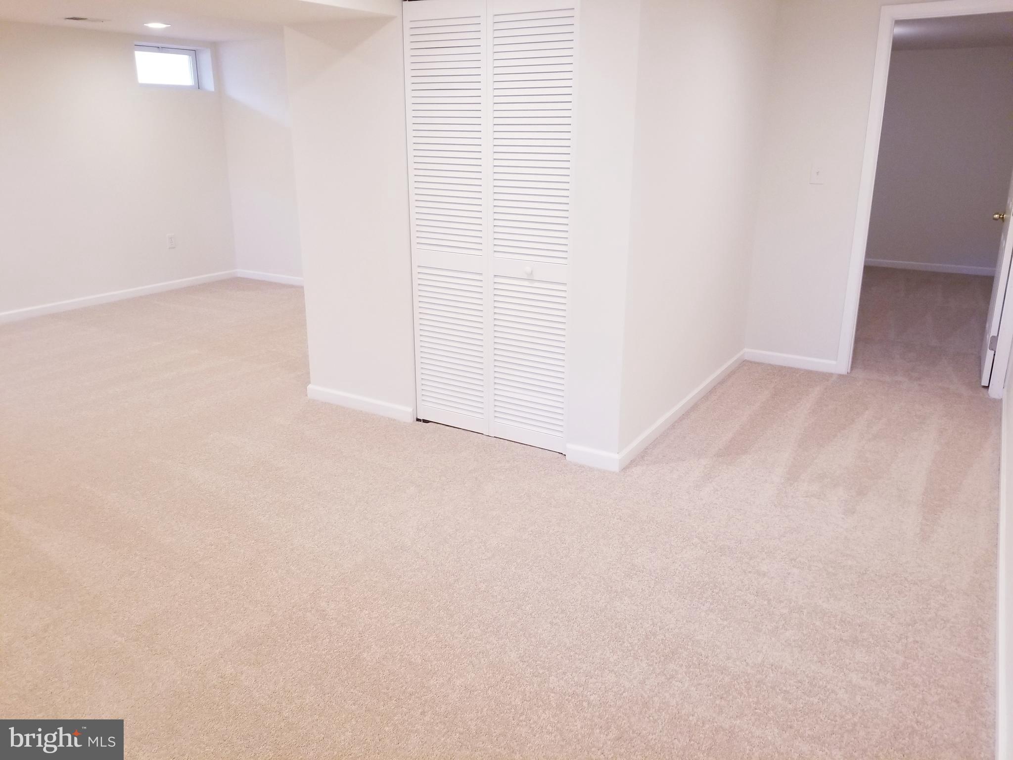 7941 East Shore Road Pasadena, MD 21122 - Photo 27 of 28 Family Room Leading to Bonus Room