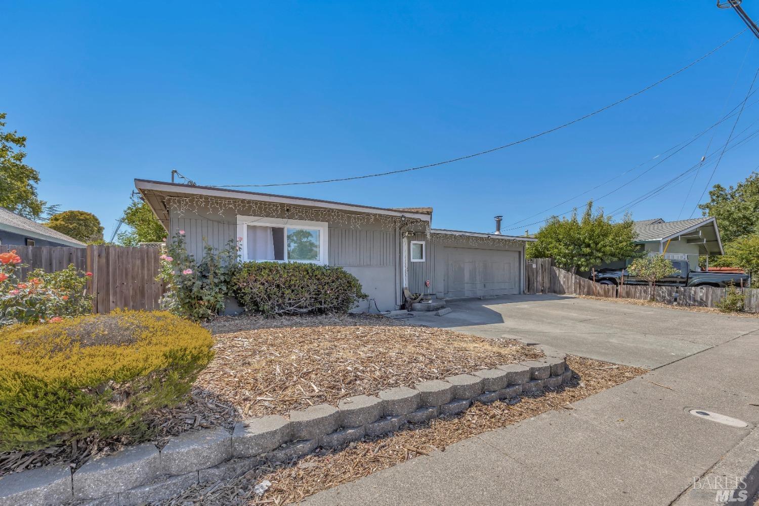 815 North Dutton Avenue Santa Rosa, CA 95401 - Photo 1 of 1 a view of a house with a yard