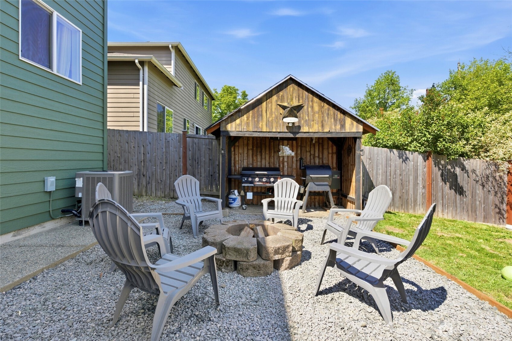 14005 Cedar Court Sultan, WA 98294 - Photo 33 of 38 a view of a chairs and table in the patio
