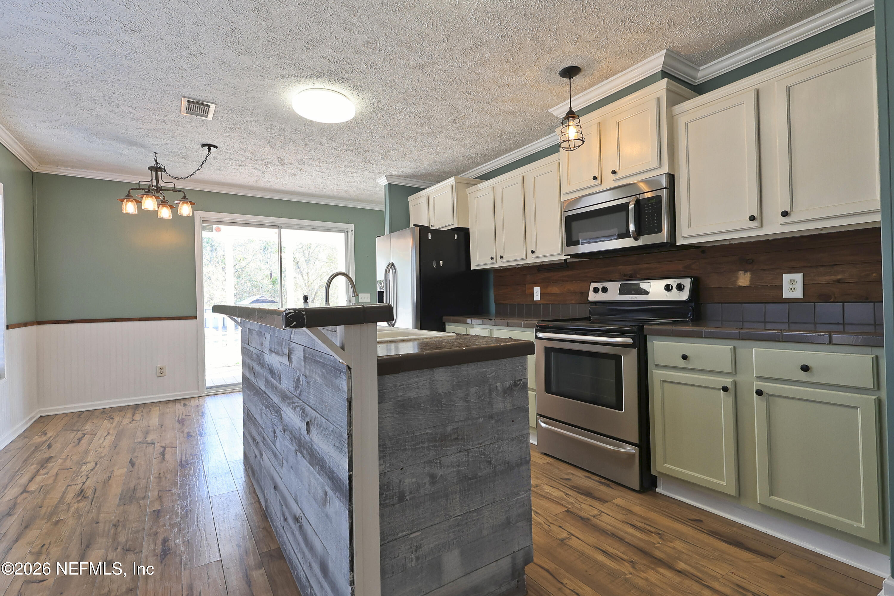 4680 Southeast 92nd Street Starke, FL 32091 - Photo 14 of 80 kitchen/dining room