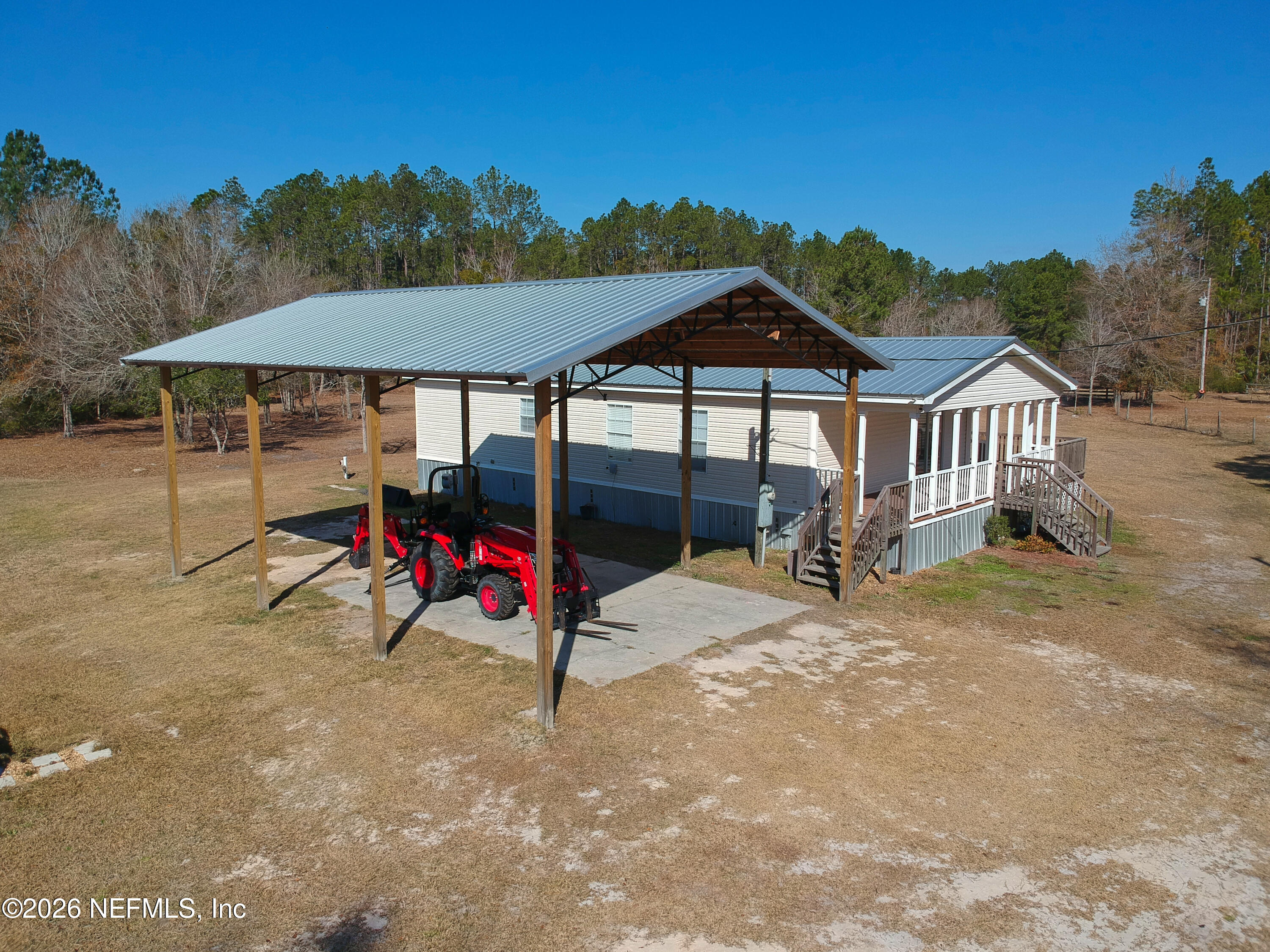 4680 Southeast 92nd Street Starke, FL 32091 - Photo 2 of 80 an outdoor space with furniture and garden view