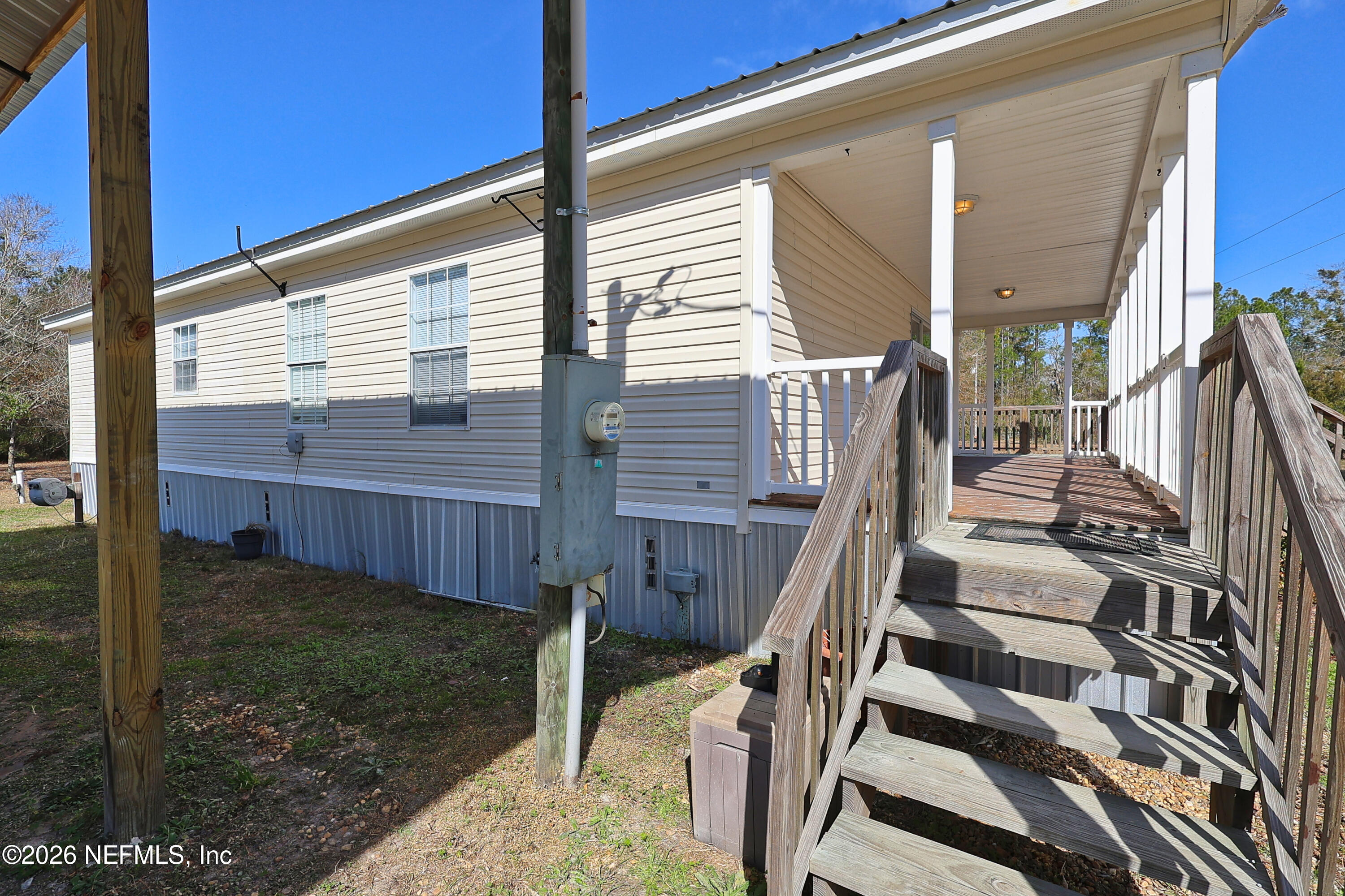 4680 Southeast 92nd Street Starke, FL 32091 - Photo 42 of 80 wrap around porch