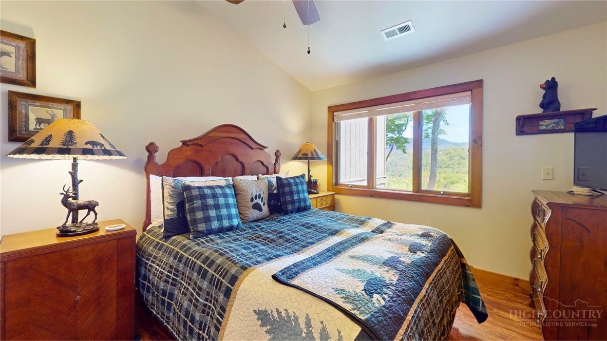 250 Ridgeview Road, Unit 43 Sugar Mountain, NC 28604 - Photo 16 of 21 a bedroom with a bed and window