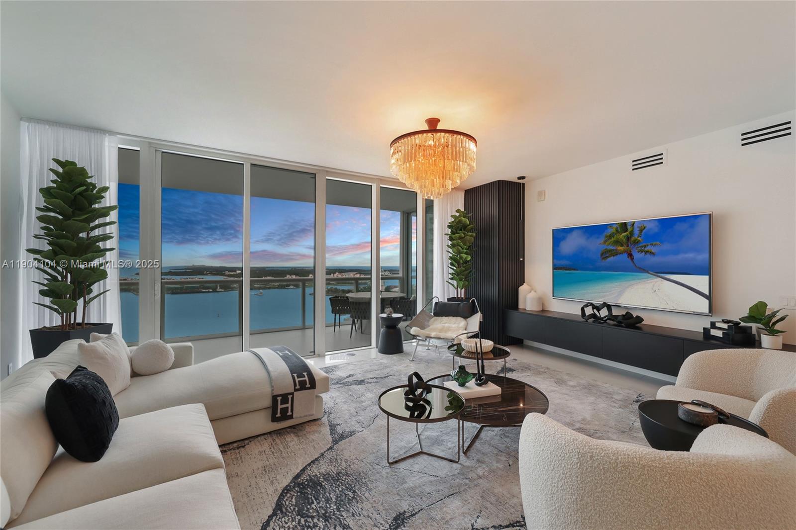 450 Alton Road, Unit 2603 Miami Beach, FL 33139 - Photo 11 of 64 a living room with furniture and a large window