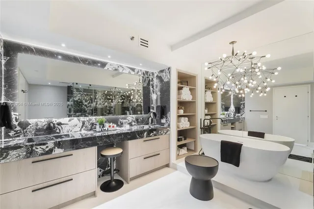 a bedroom with a bed and a desk