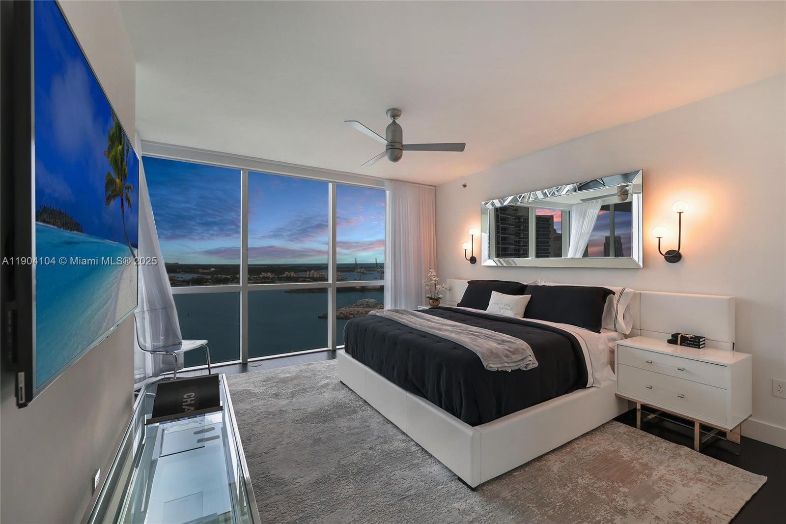 450 Alton Road, Unit 2603 Miami Beach, FL 33139 - Photo 28 of 64 a bedroom with a bed and a window