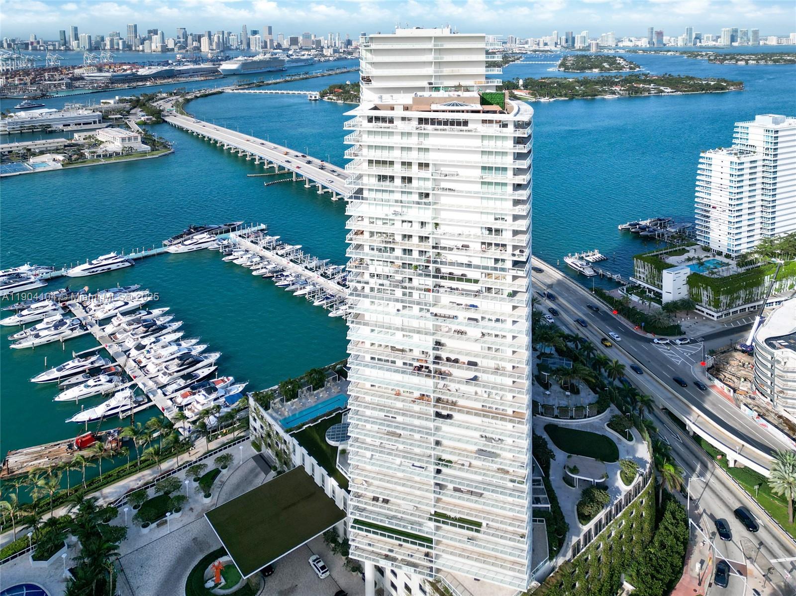 450 Alton Road, Unit 2603 Miami Beach, FL 33139 - Photo 36 of 64 a view of a lake with a city skyline in the background
