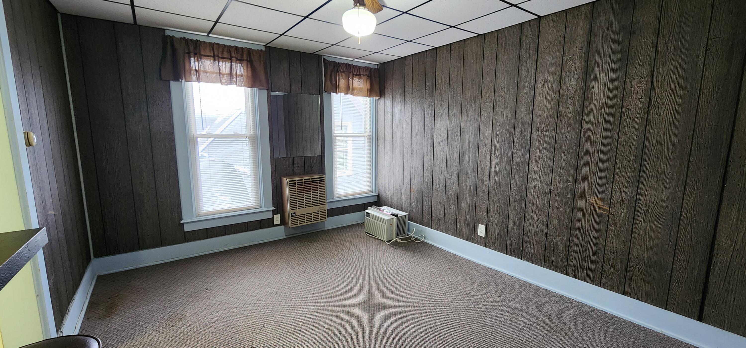 388 3rd Street, Unit 3 Manistee, MI 49660 - Photo 2 of 11 Living Space (1) 20240325_113903