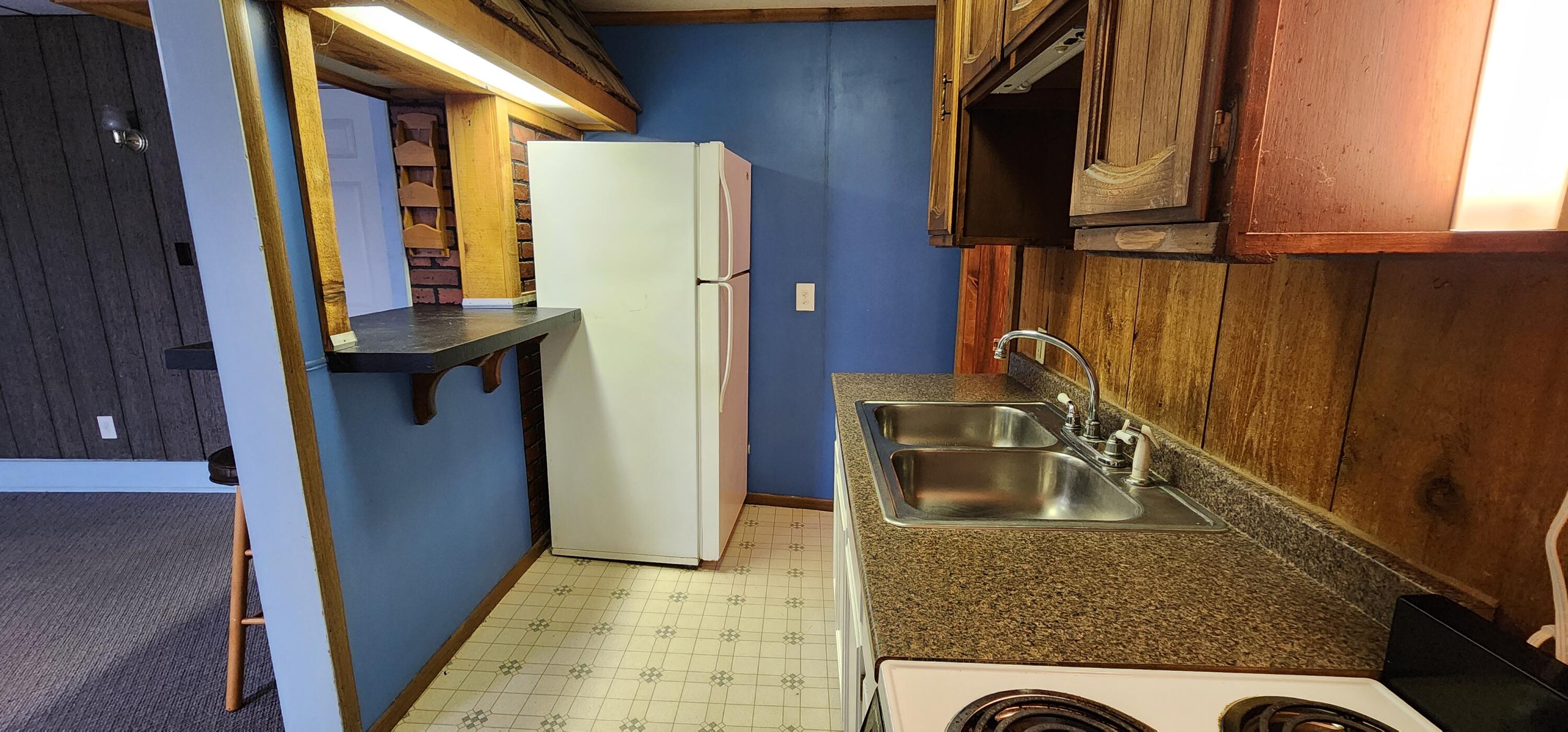 388 3rd Street, Unit 3 Manistee, MI 49660 - Photo 6 of 11 Kitchen (3) 20240325_113756